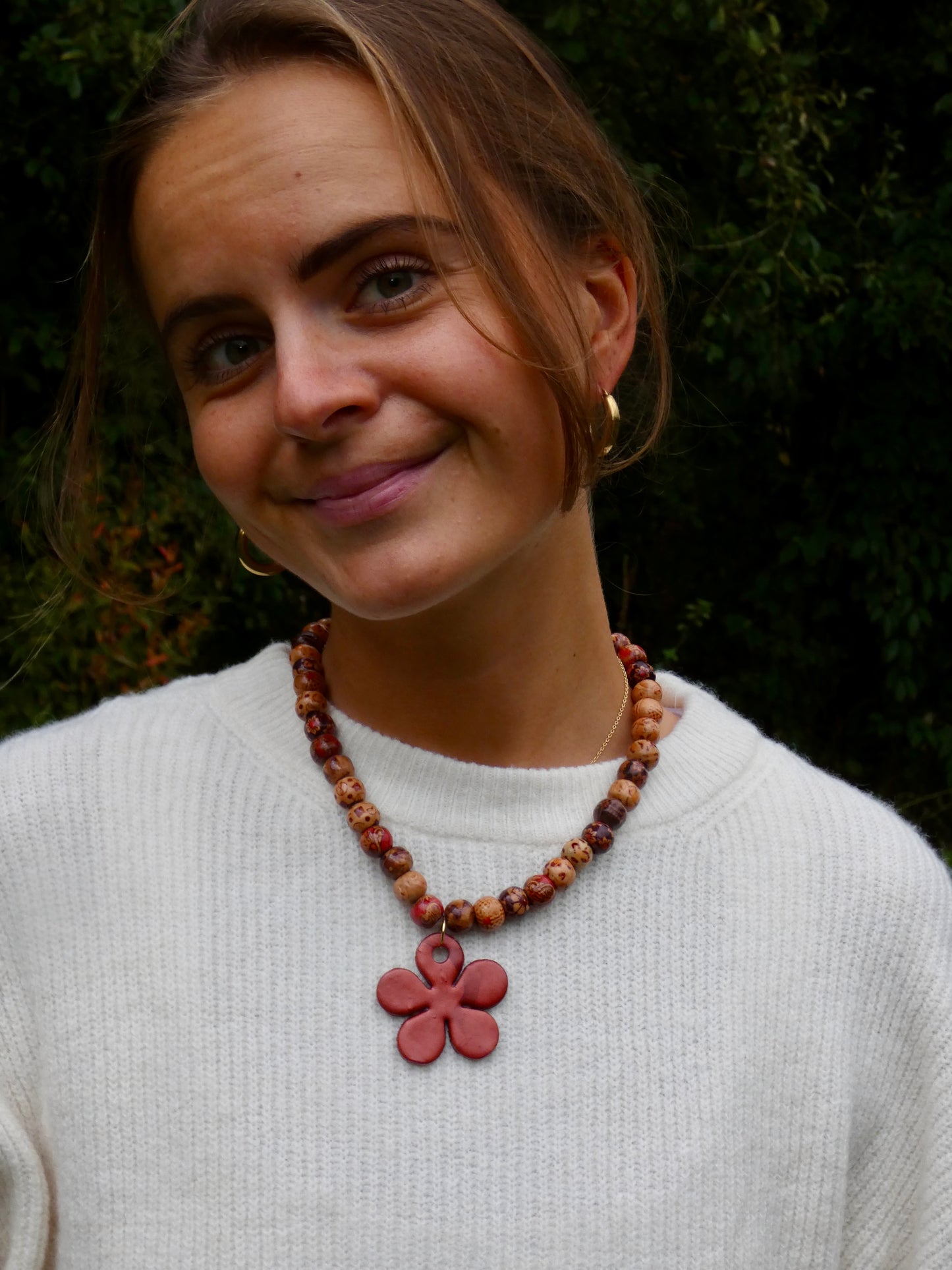 Kralenketting met bloem